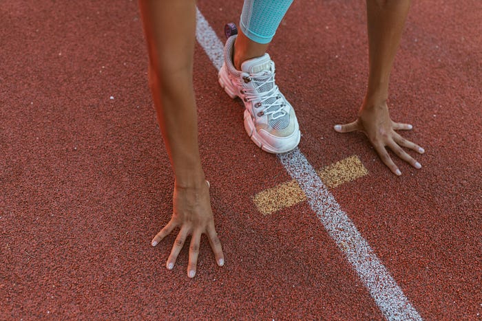 Kneeling foot stretch for plantar fasciitis relief