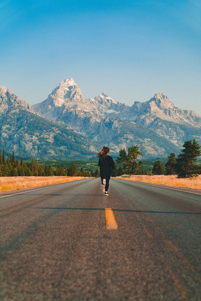 A woman running towards a bus, symbolizing seizing opportunities.