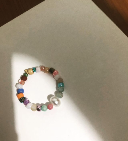 DIY beaded ring creation process