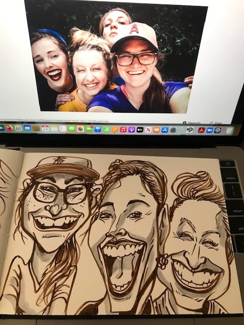 Caricature artist drawing live portraits.