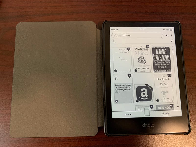 A Kindle Paperwhite Signature Edition on a desk